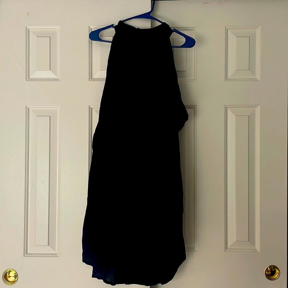 High necked black shift dress. Great for a date night or wedding!
